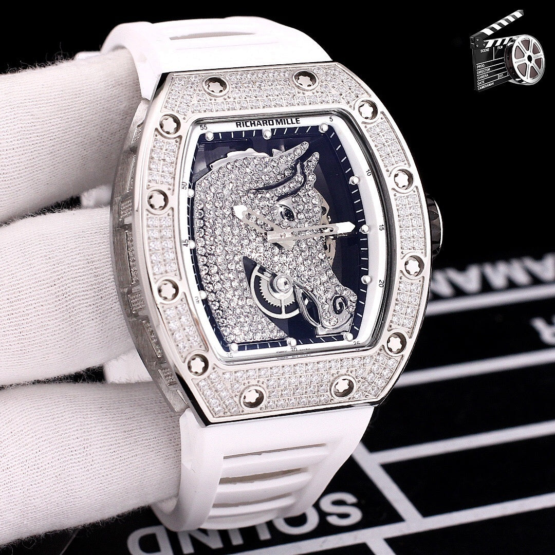 Richard Mille watch with diamond-set case, white rubber strap, blue skeleton dial view