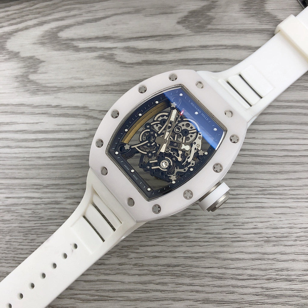 Richard Mille watch with white strap and square case, blue-black skeleton dial