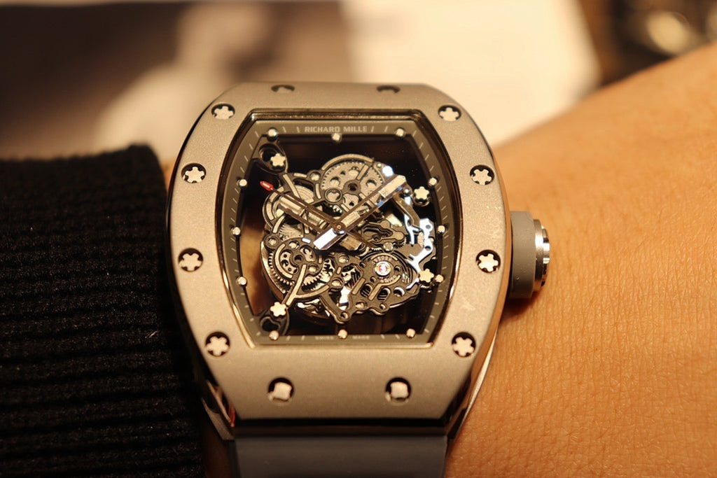 Richard Mille wristwatch close-up of skeleton dial and silver-toned case