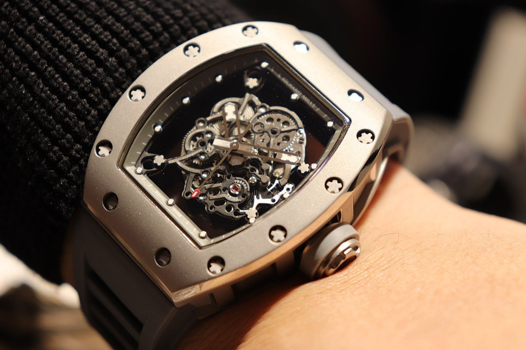 Richard Mille wristwatch close-up on wrist with open-work dial