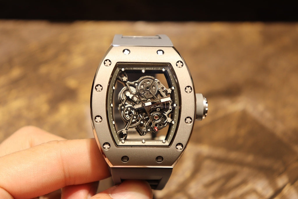 Richard Mille wristwatch on hand, skeleton dial with silver-toned case