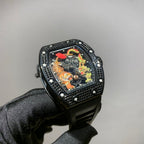 Dark-toned wristwatch with jeweled bezel, colorful skeleton dial, and black strap
