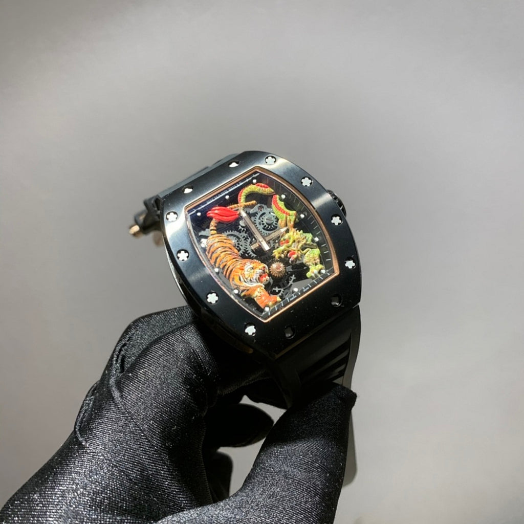 Richard Mille watch with black case, dark strap, and colorful skeleton dial with dragon motif