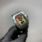 Richard Mille watch with silver-toned case, black strap, and colorful skeleton dial with dragon motif