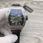 Rose-gold tonneau watch with diamond bezel and black strap