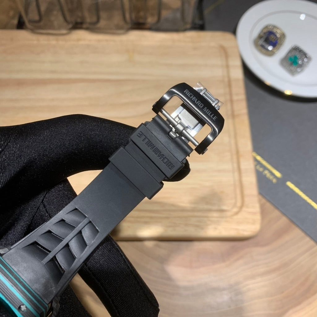 Richard Mille wristwatch buckle and clasp on black rubber strap