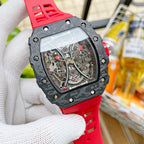 Richard Mille wristwatch with black camo case, red strap, and transparent skeleton dial.