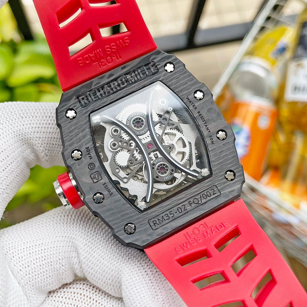 Richard Mille watch caseback with textured black design and visible mechanical components.