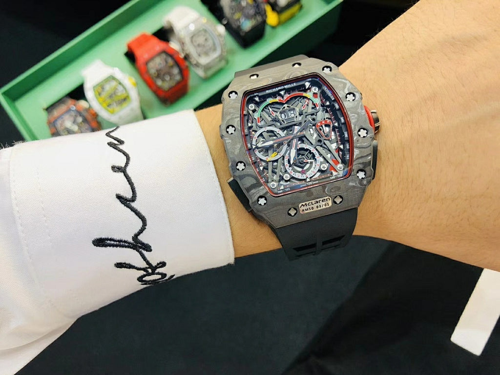 Richard Mille watch with skeleton dial and black strap, shown front view
