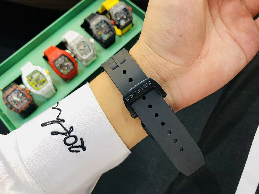 Richard Mille watch black rubber strap with buckle holes and branded clasp