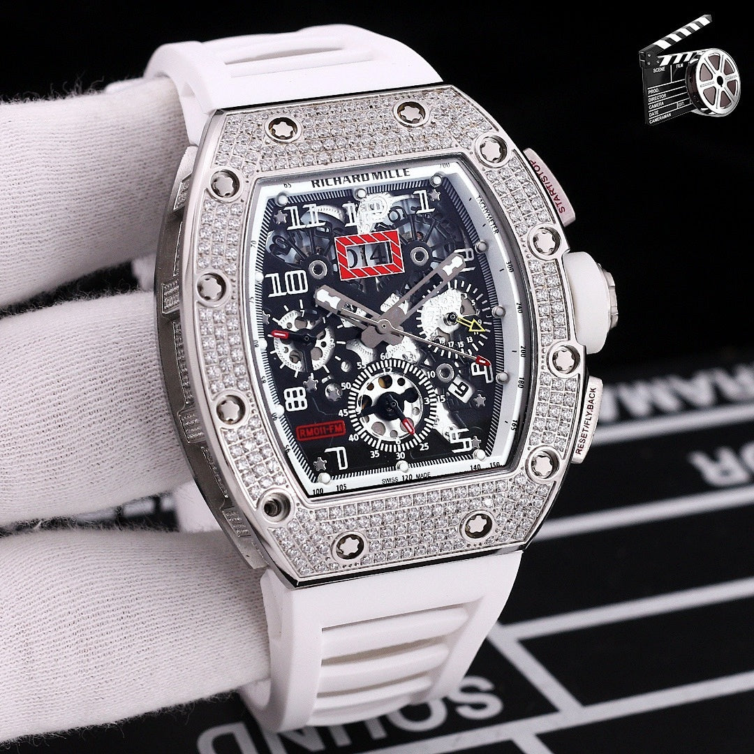 Wristwatch with silver case, white silicone strap, skeleton dial with colorful elements