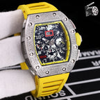 Wristwatch with silver case, yellow silicone strap, skeleton dial with visible gears
