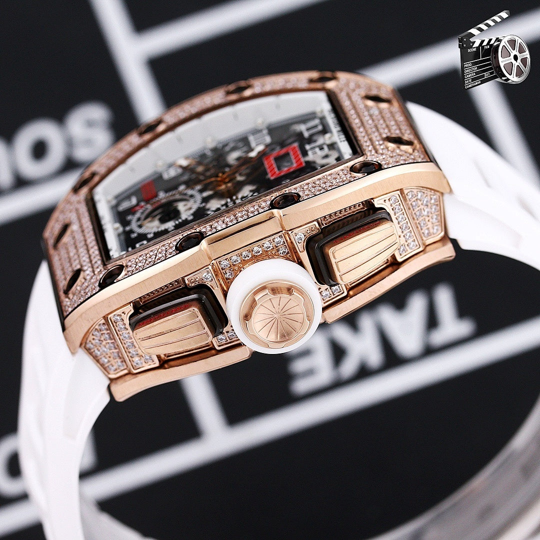 Rose gold diamond watch with white silicone strap, angled side view of case.