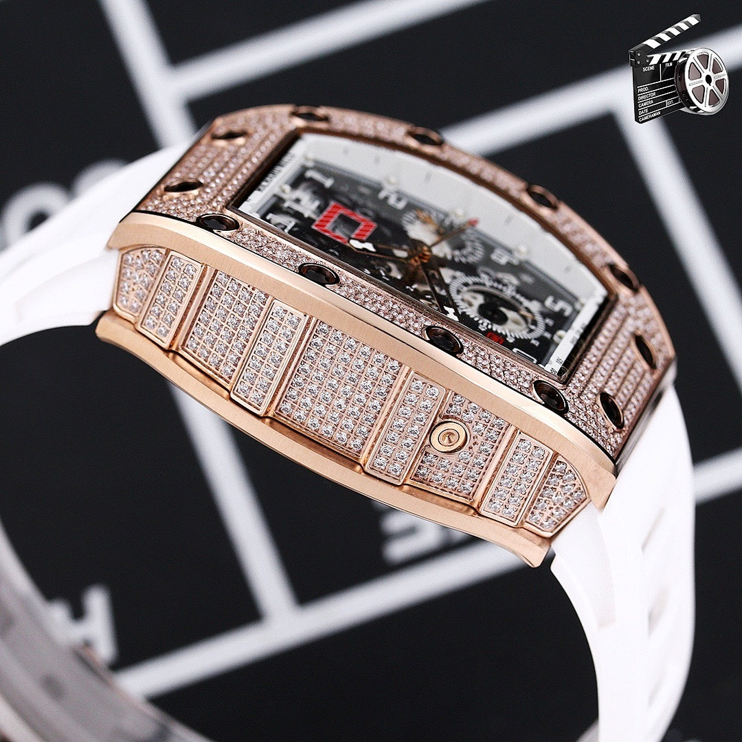 Rose gold diamond watch case with white silicone strap, side view with bezel details.