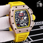 Rose gold diamond bezel wristwatch with yellow silicone strap and skeleton dial.
