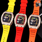 Three Richard Mille watches: rose-gold jeweled cases with yellow, red, orange silicone straps