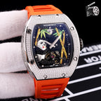 Richard Mille watch, jeweled silver case, blue skeleton dial, orange rubber strap