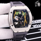 Richard Mille watch with purple rubber strap, stainless case, skeleton dial with green accents.