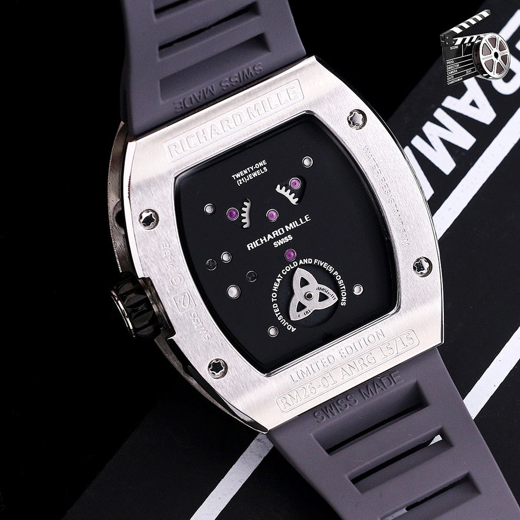 Richard Mille watch with dark case back, visible mechanical details and purple accents.