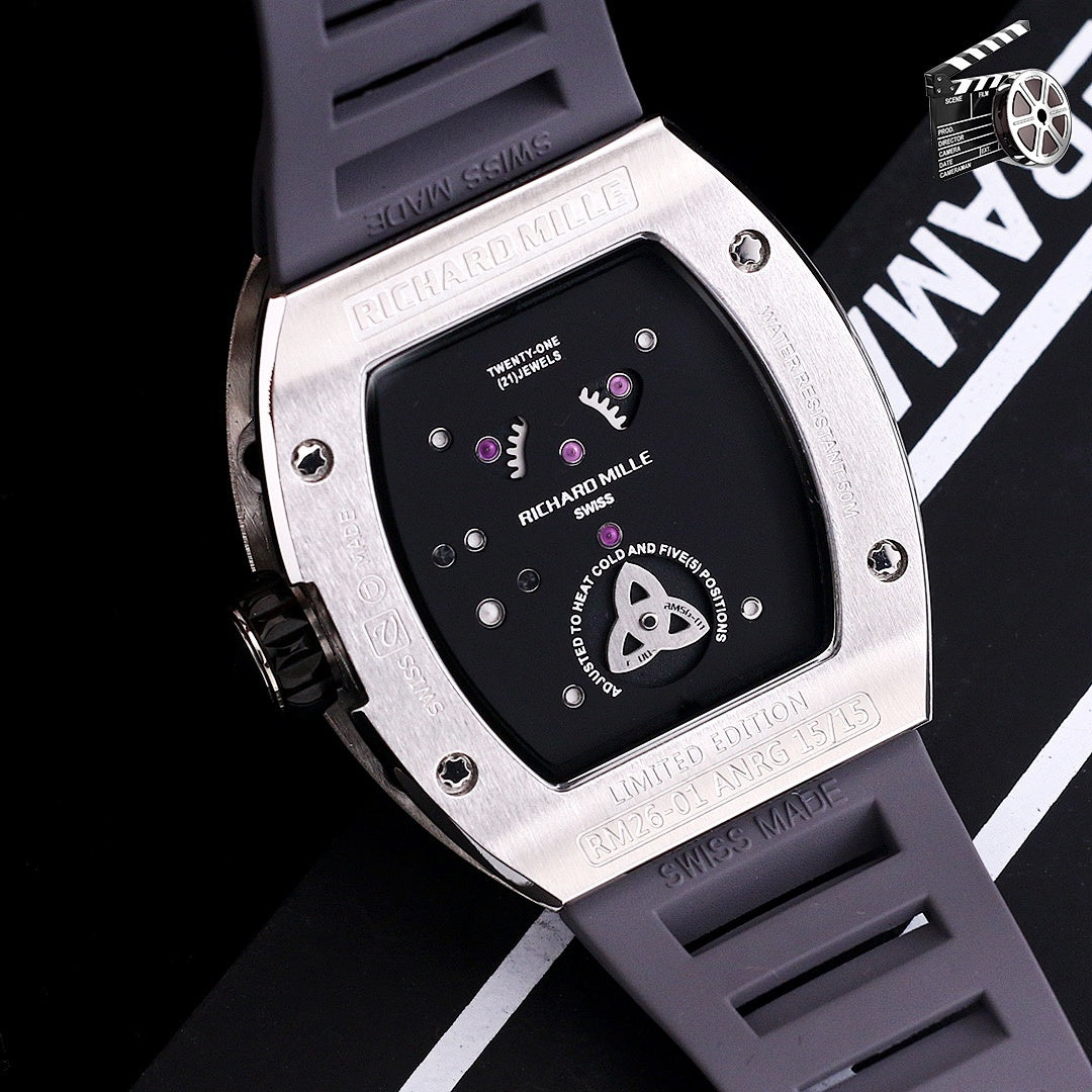Richard Mille watch with dark case back, visible mechanical details and purple accents.