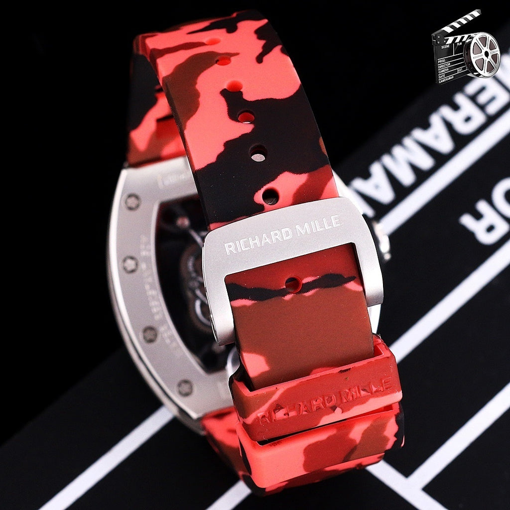 Richard Mille watch side view with camo red strap and red case panel, stainless edges