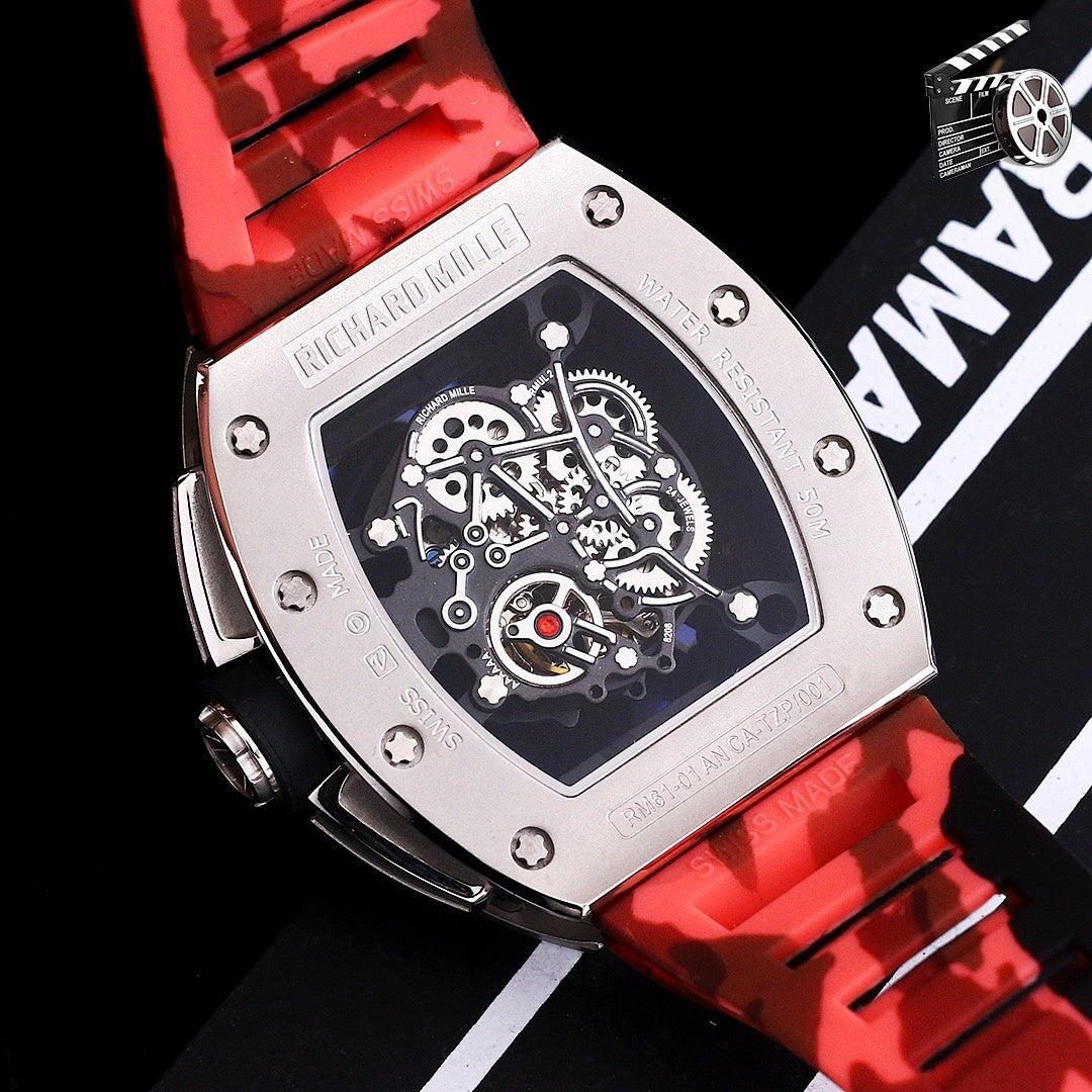 Richard Mille watch top view with camo red strap and exposed mechanical dial, stainless case