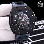Richard Mille wristwatch with gray camo rubber strap, black case, skeleton dial