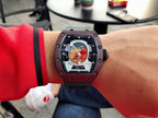 Richard Mille watch with green strap, close-up of skeleton dial on wrist