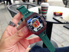 Richard Mille watch with green strap and dark case, openwork skeleton dial