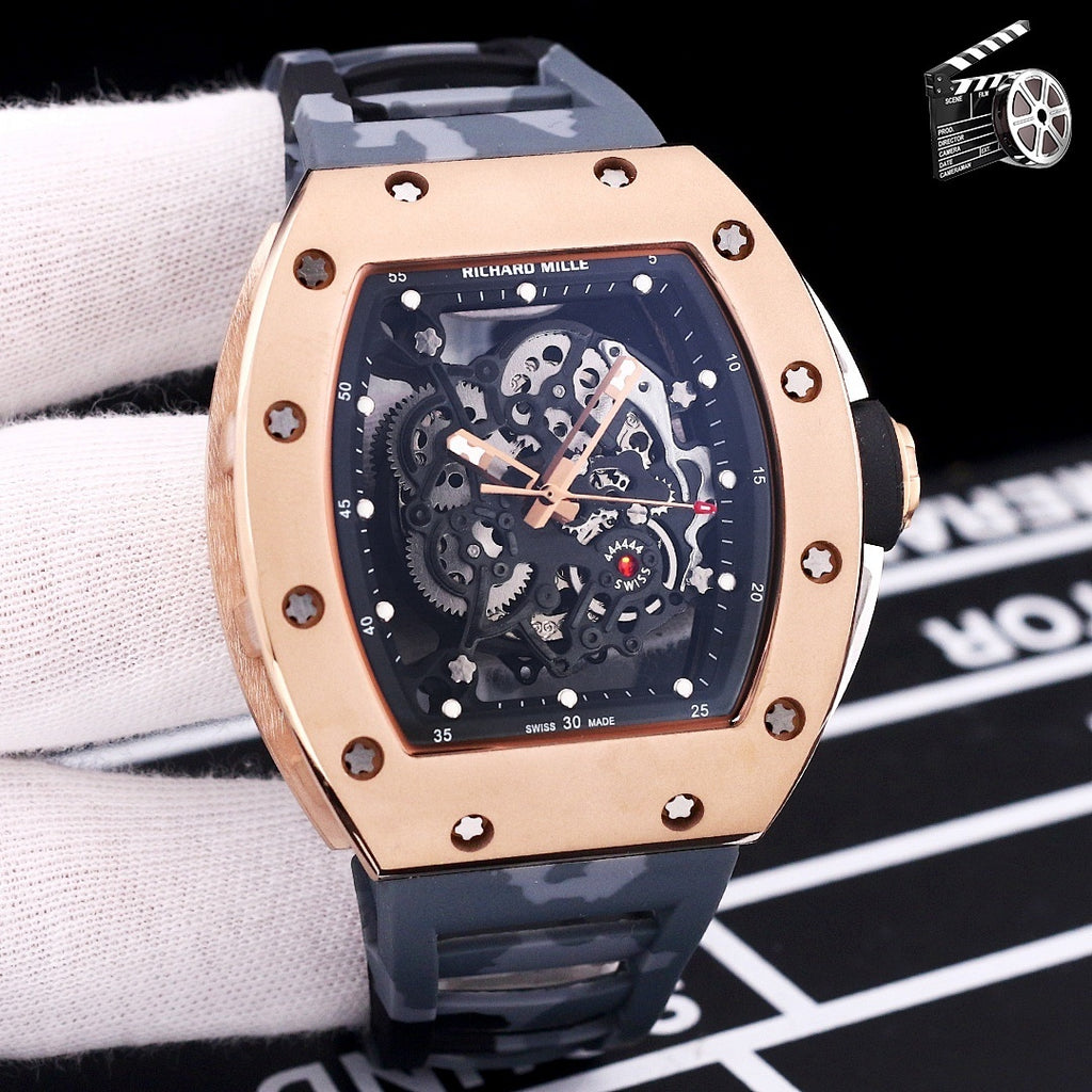 Richard Mille watch with rose-gold case and black silicone strap, skeleton dial.