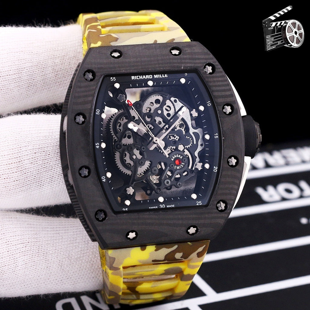 Yellow camo rubber strap watch with black case and skeleton dial with exposed mechanics.