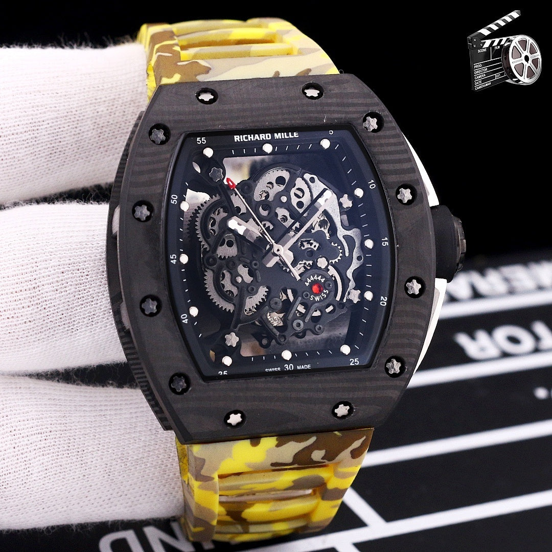 Yellow camo rubber strap watch with black case and skeleton dial with exposed mechanics.