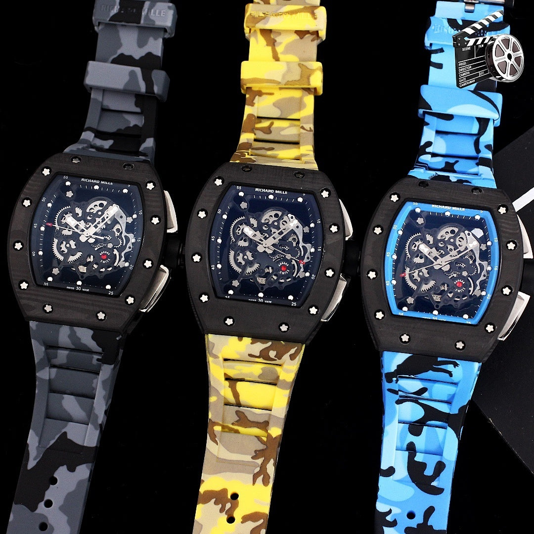 Set of three camouflage rubber strap watches with black cases and skeleton dials.