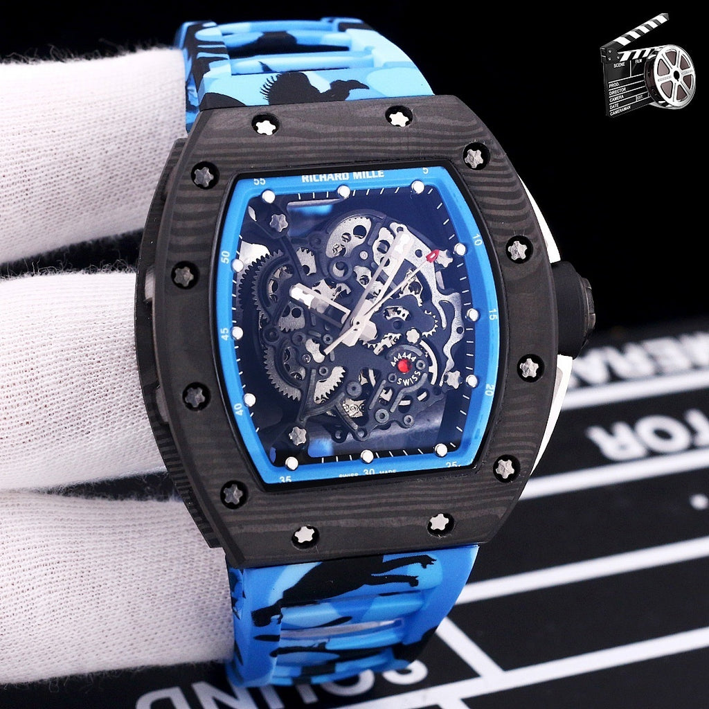 Blue camo rubber strap watch with black case and blue-edged skeleton dial.