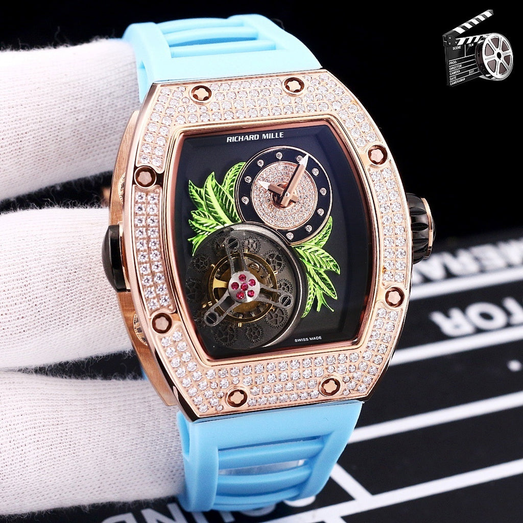 Richard Mille watch, light blue silicone strap, crystal bezel, skeleton dial with green leaves