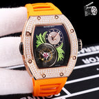 Richard Mille watch, orange silicone strap, crystal bezel, skeleton dial with green leaves