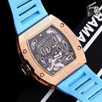 Richard Mille watch case back with visible movement and blue silicone strap.