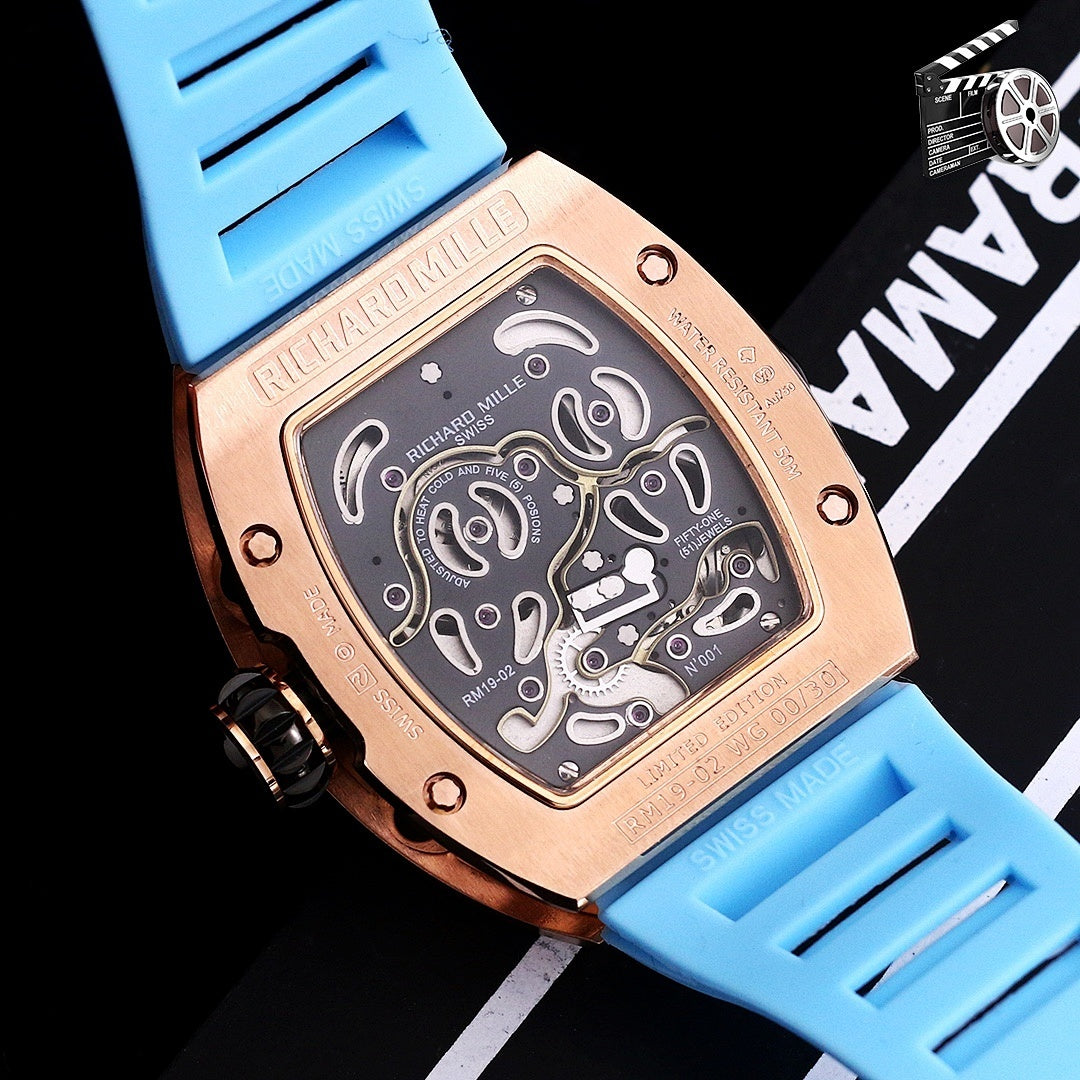 Richard Mille watch case back with visible movement and blue silicone strap.