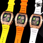 Richard Mille watches with yellow, orange, and white silicone straps, rose-gold cases.