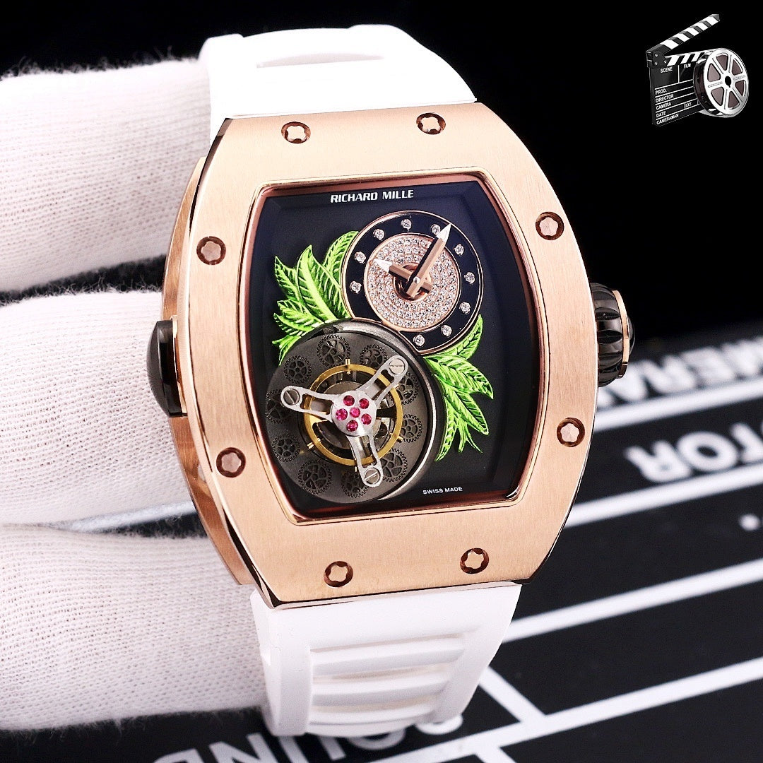 Richard Mille watch with rose-gold case and white silicone strap, skeleton dial detail.