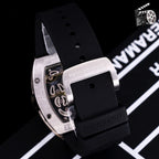 Richard Mille watch side profile with black silicone strap and stainless-steel case