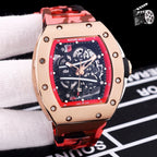 Richard Mille watch with rose gold case and red camo rubber strap, skeleton dial.