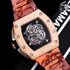 Richard Mille watch on rose gold case with orange camo rubber strap, open-work dial.