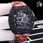 Richard Mille-style skeleton sport watch with black case and orange camo rubber strap