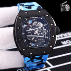 Richard Mille-style skeleton sport watch with black case and blue camo rubber strap, front