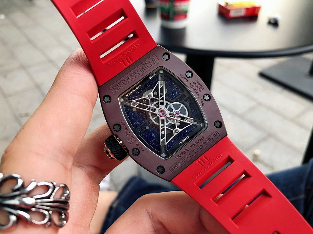 Richard Mille watch back view with red rubber strap and skeleton-style dial