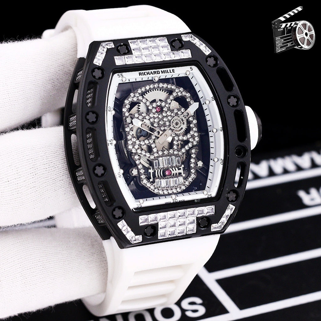 Richard Mille watch with white silicone strap, black case, deep blue jeweled skeleton skull dial
