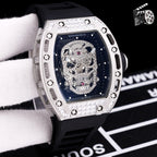 Richard Mille watch with black silicone strap, silver-toned case, jeweled skeleton skull dial
