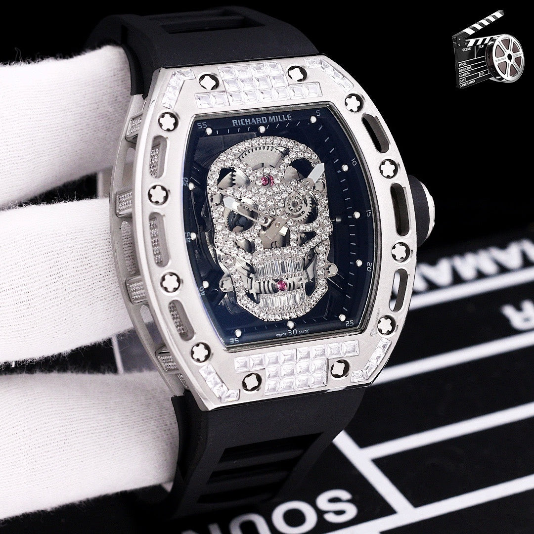 Richard Mille watch with black silicone strap, silver case, jeweled skeleton skull dial