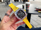 Richard Mille watch with yellow silicone strap and jeweled silver bezel